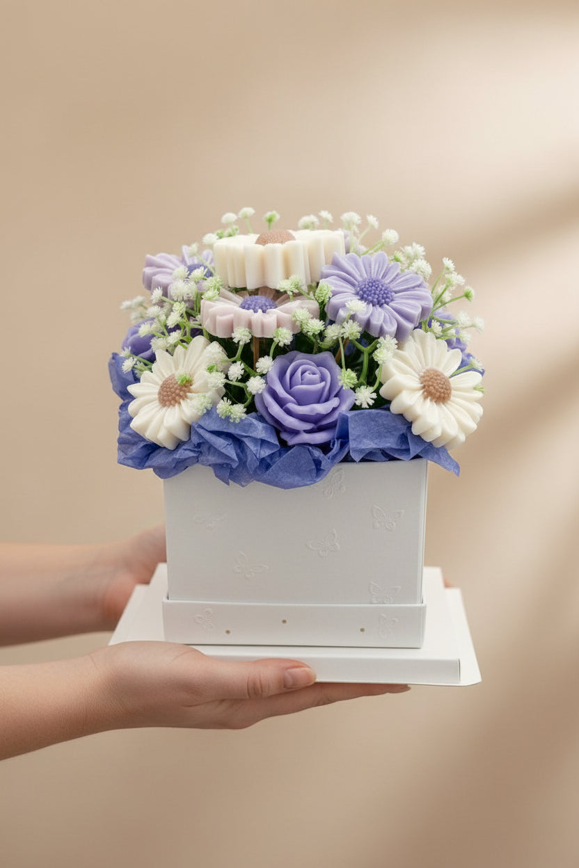 WAX MELT flower arrangement in a white box on a light gray background
