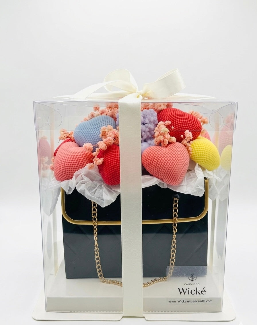 Handbag with colorful heart-shaped flowers in packaging, brand 'Wicke' visible