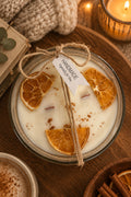 Santal Bois and Orange dried flower bowl candle with dried orange and cinnamon in a glass bowl