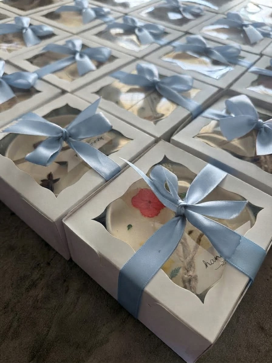 Pressed flower candle gift boxes with ribbon, keepsakes for a bridal shower