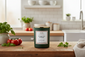 Wické Tomato Vines candle with a gold lid on a white background