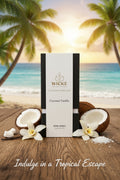 A single box of Wické Coconut Vanilla Pearl Wax Candle centered on a rustic wooden table. It is beautifully framed by cracked coconut halves, a sprinkle of wax pearls, and vanilla orchid blossoms. The background opens up to a sun-drenched tropical beach with palm trees and a soft sunset glow, featuring the elegant white text, "Indulge in a Tropical Escape."