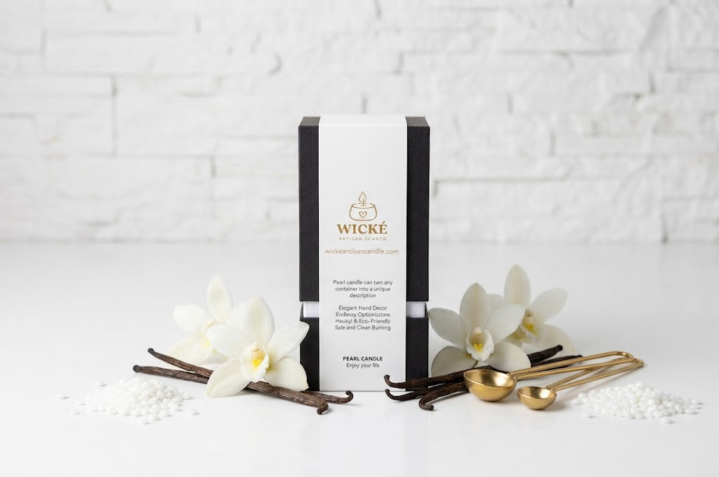 Single vanilla scent Wické candle box with vanilla orchids and pods in a clean studio setting.